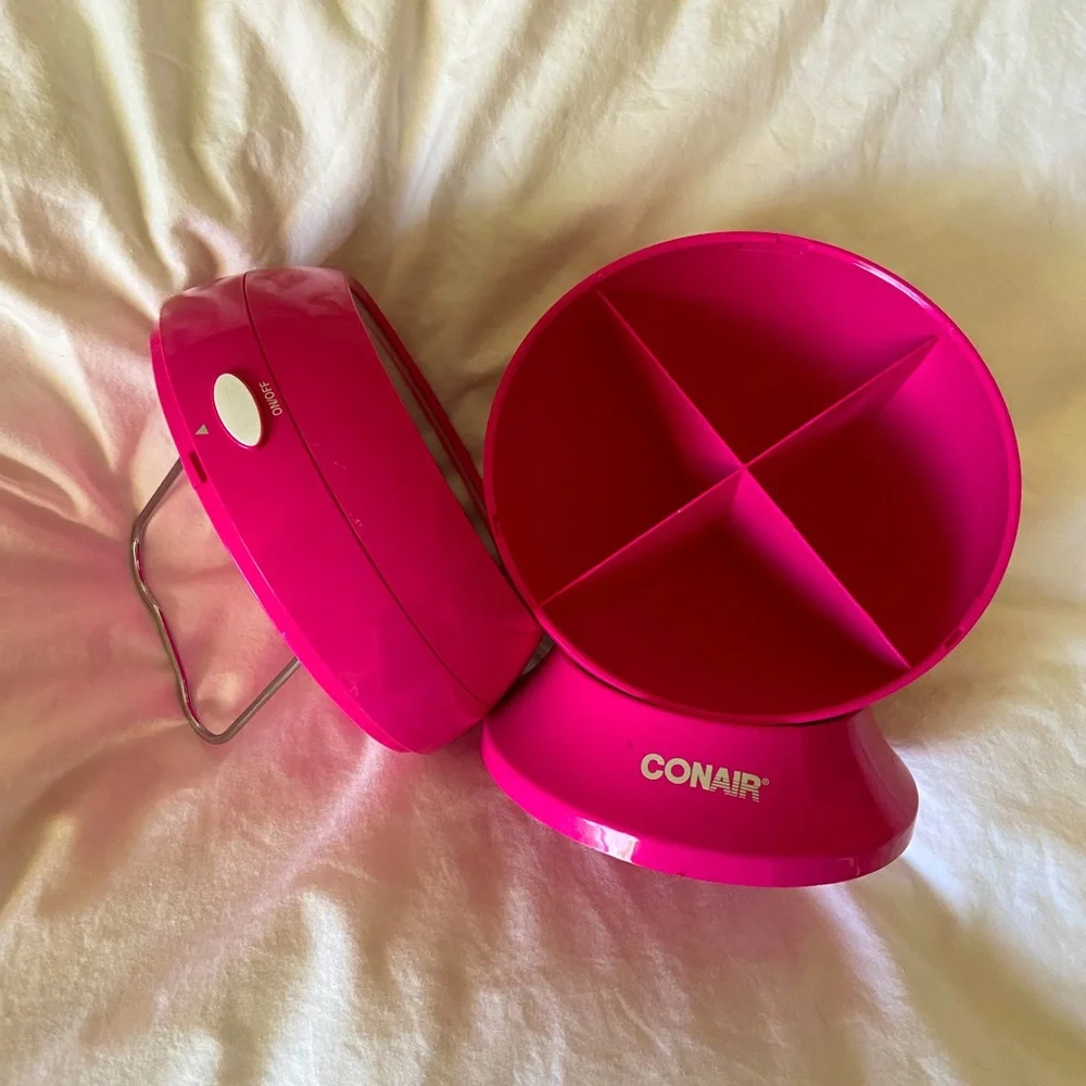 Conair mirror with light and jewelery storage.